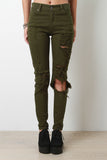 Mid-Rise Distressed Skinny Jeans